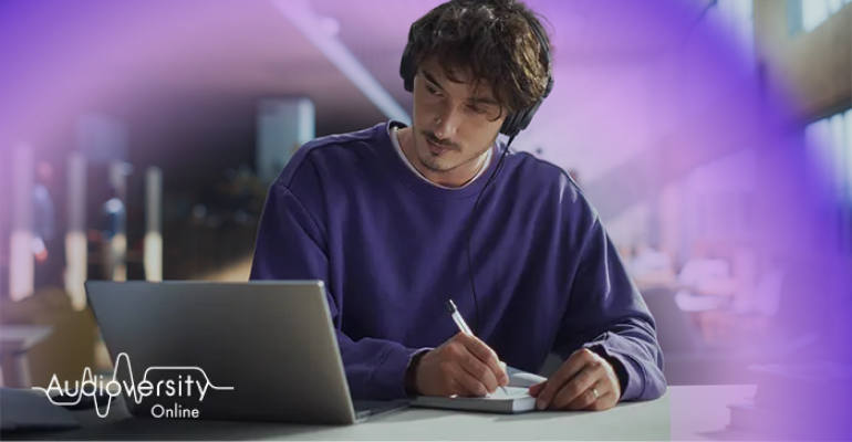 Audioversity Online logo and aura behind a man focused on an online training session.